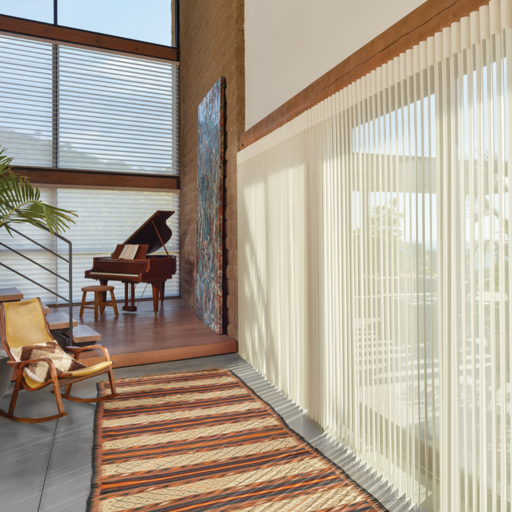 Music room Sliding door vertical sheer shades open with a view to deck