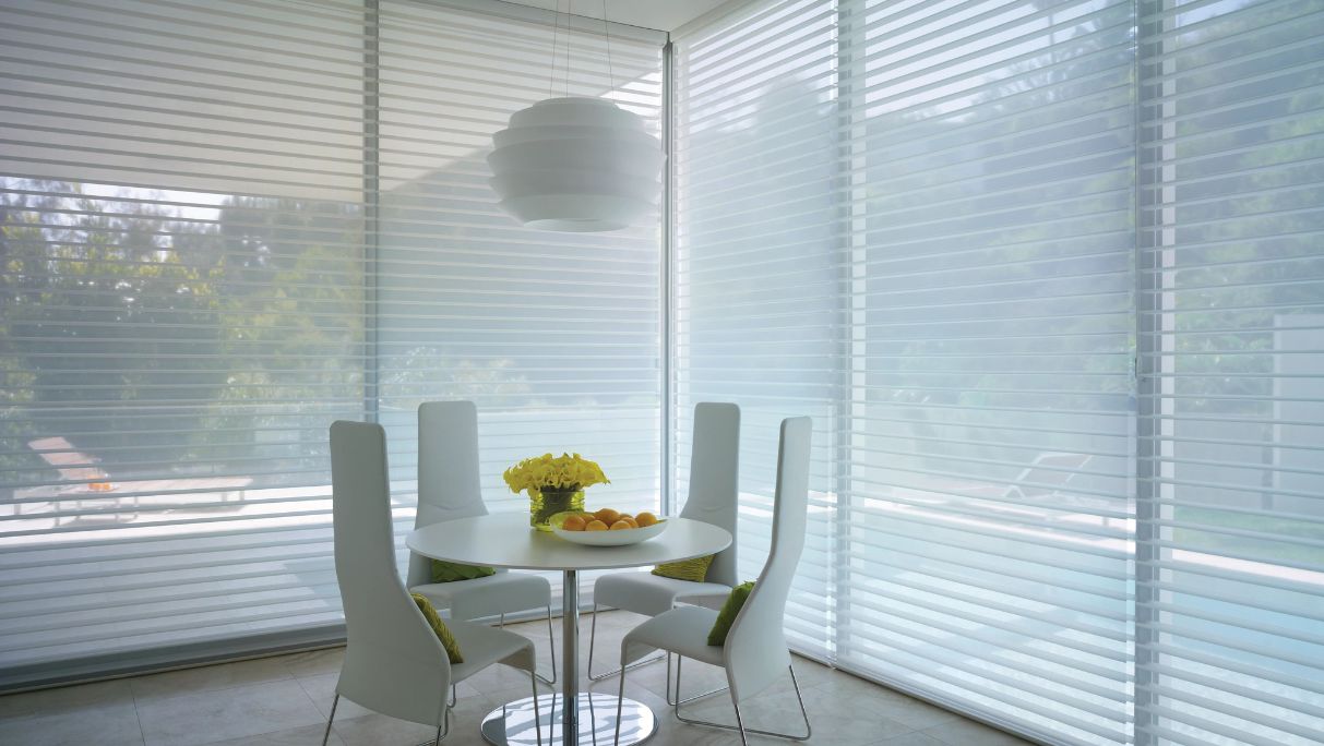 Open Light filtering window shades with view of outside pool