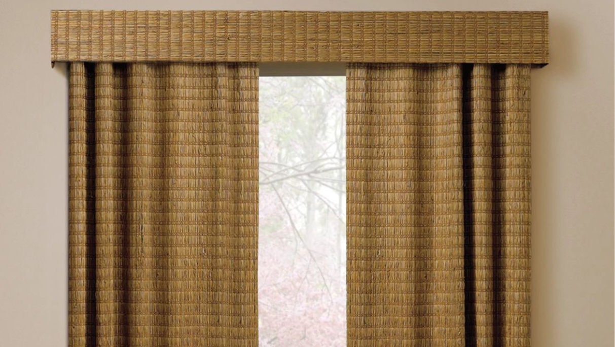 Light brown woven wood drapery with liner open in center