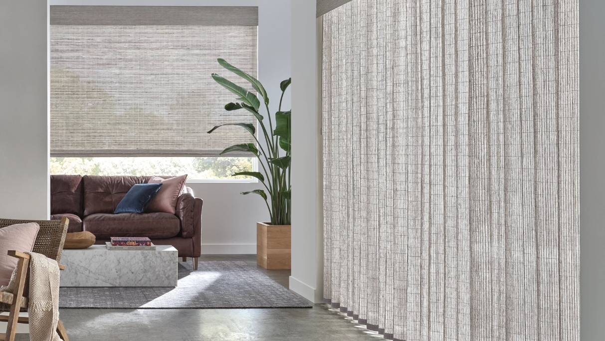 Light brown Semi-sheer woven wood shades and drapery on long window on right