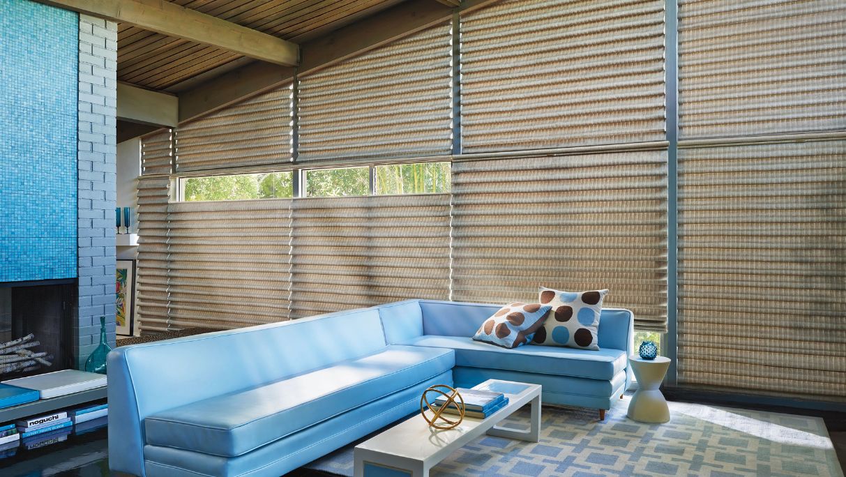 Living room with roman shade partially open