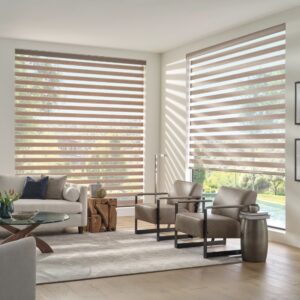 Open banded shades in living room with view to a pool and trees