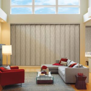 Wide fabric panels closed in living room with large window above open with sky view