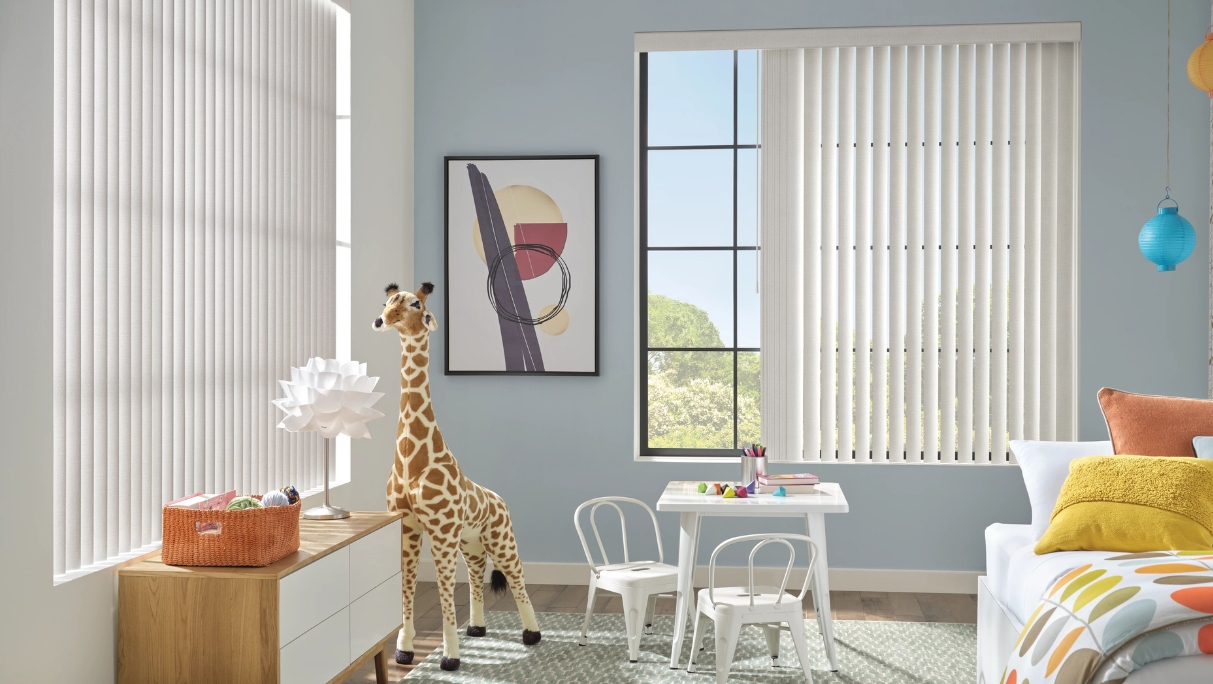 Vertical blinds 25% open in nursery with toy giraffe, kids table and chairs + sofa