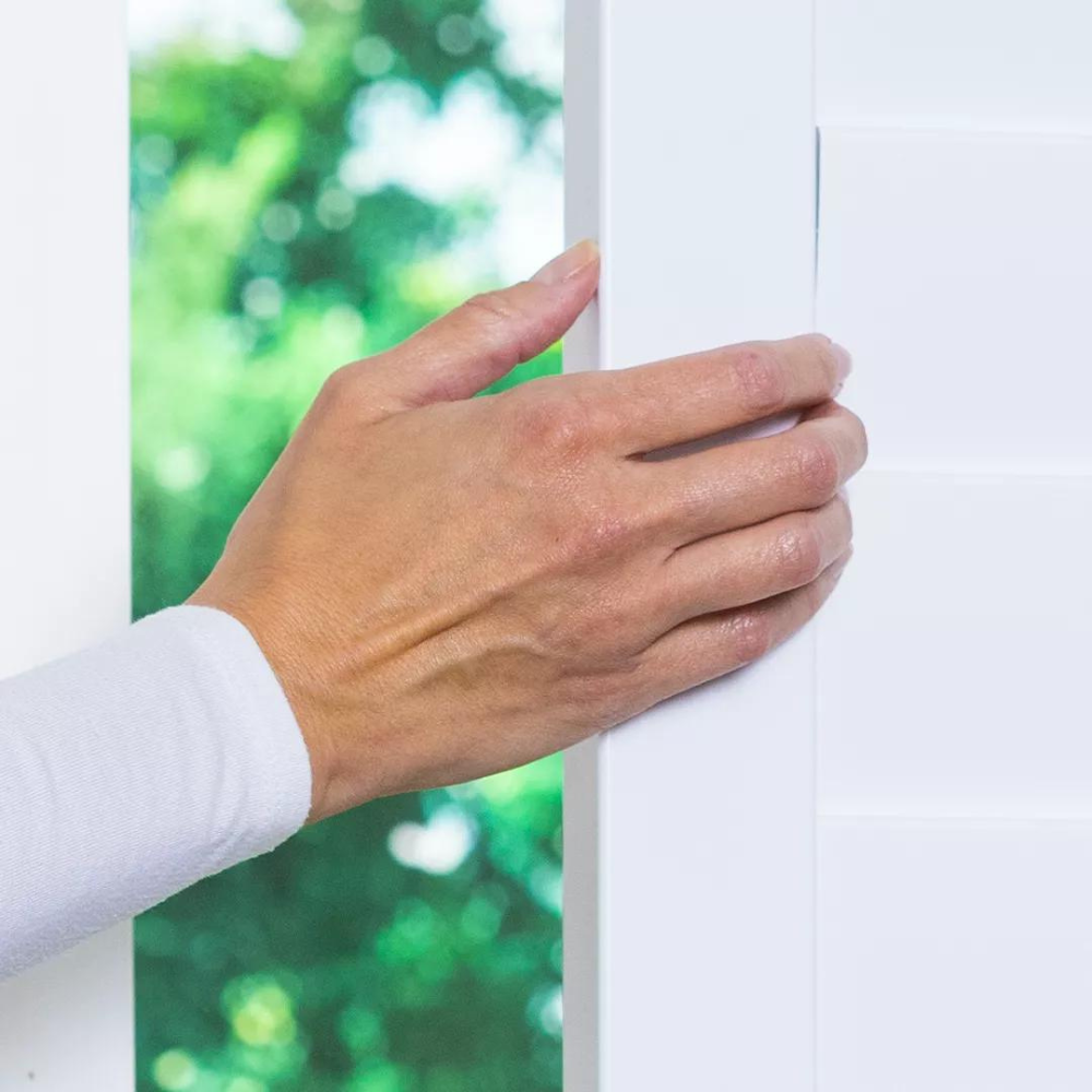 Hand-sliding shutter panels in the direction of patio glass door opening