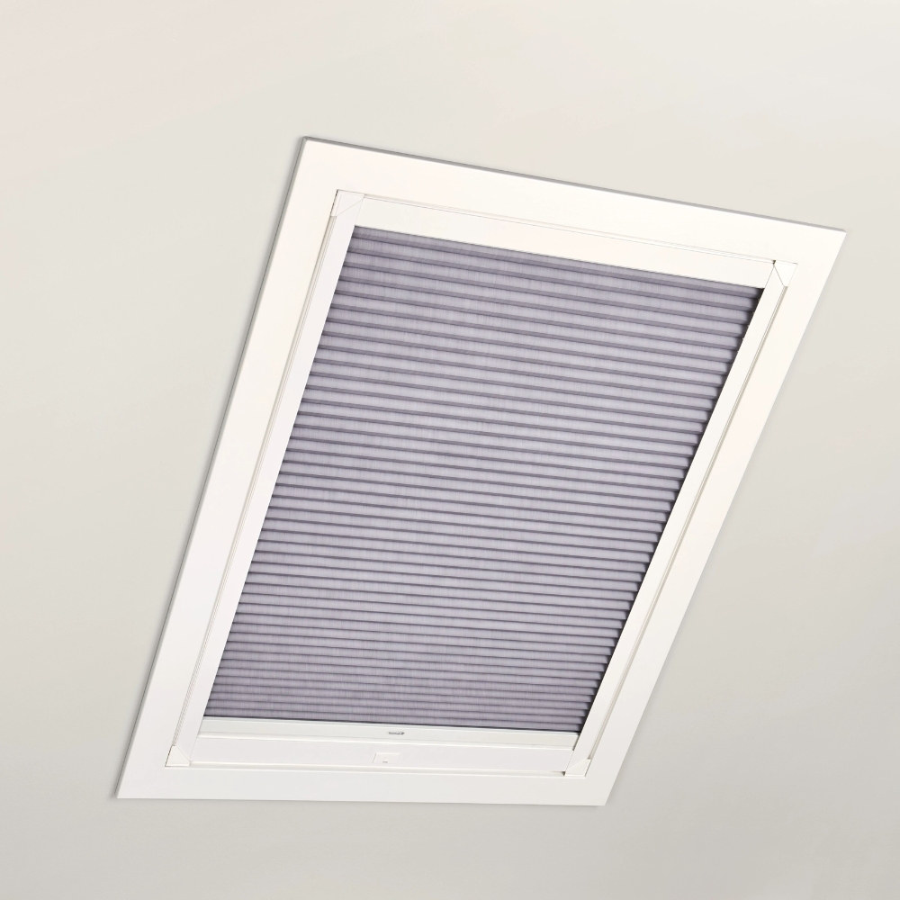 skylight window shade closed with white frame