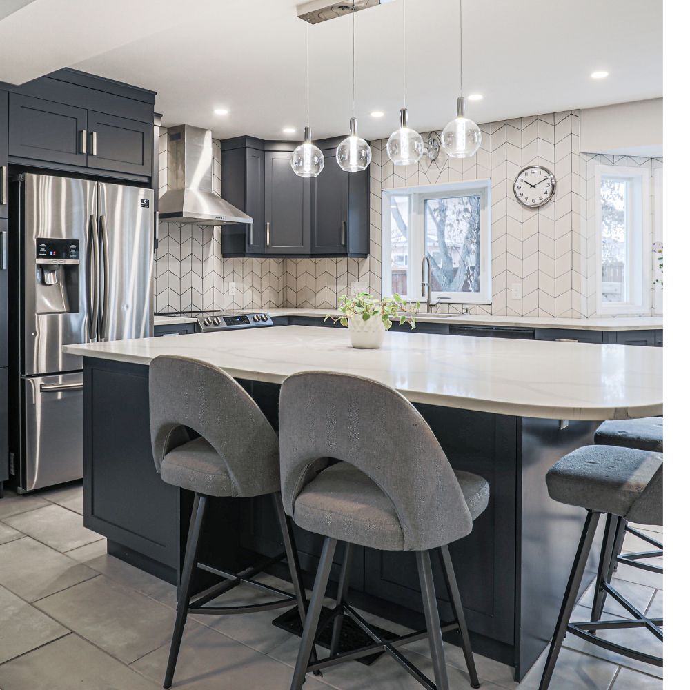 Kitchen Island with pendant lighting navy blue cabinets with white tile backsplash