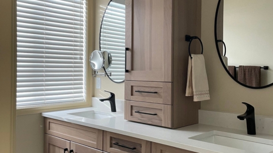 dual sinks and lots of storage in ensuite bathroom