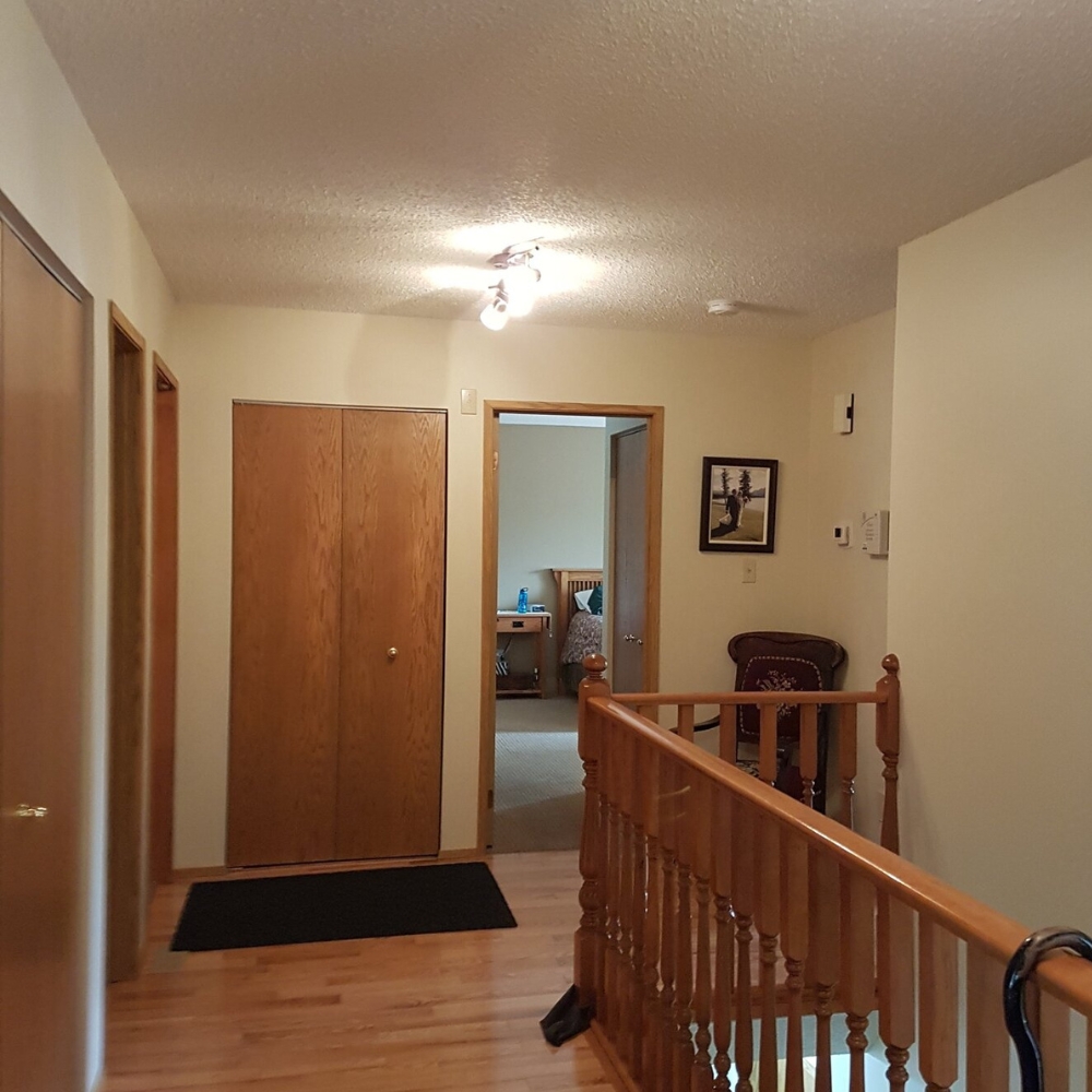 Hallway and stairwell before