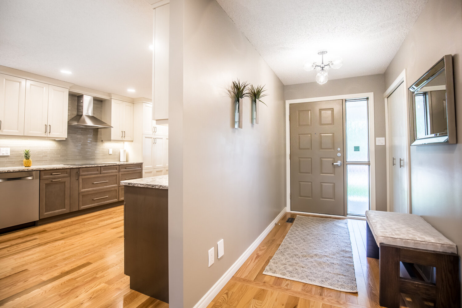 foyer and view of kitchen from hallway