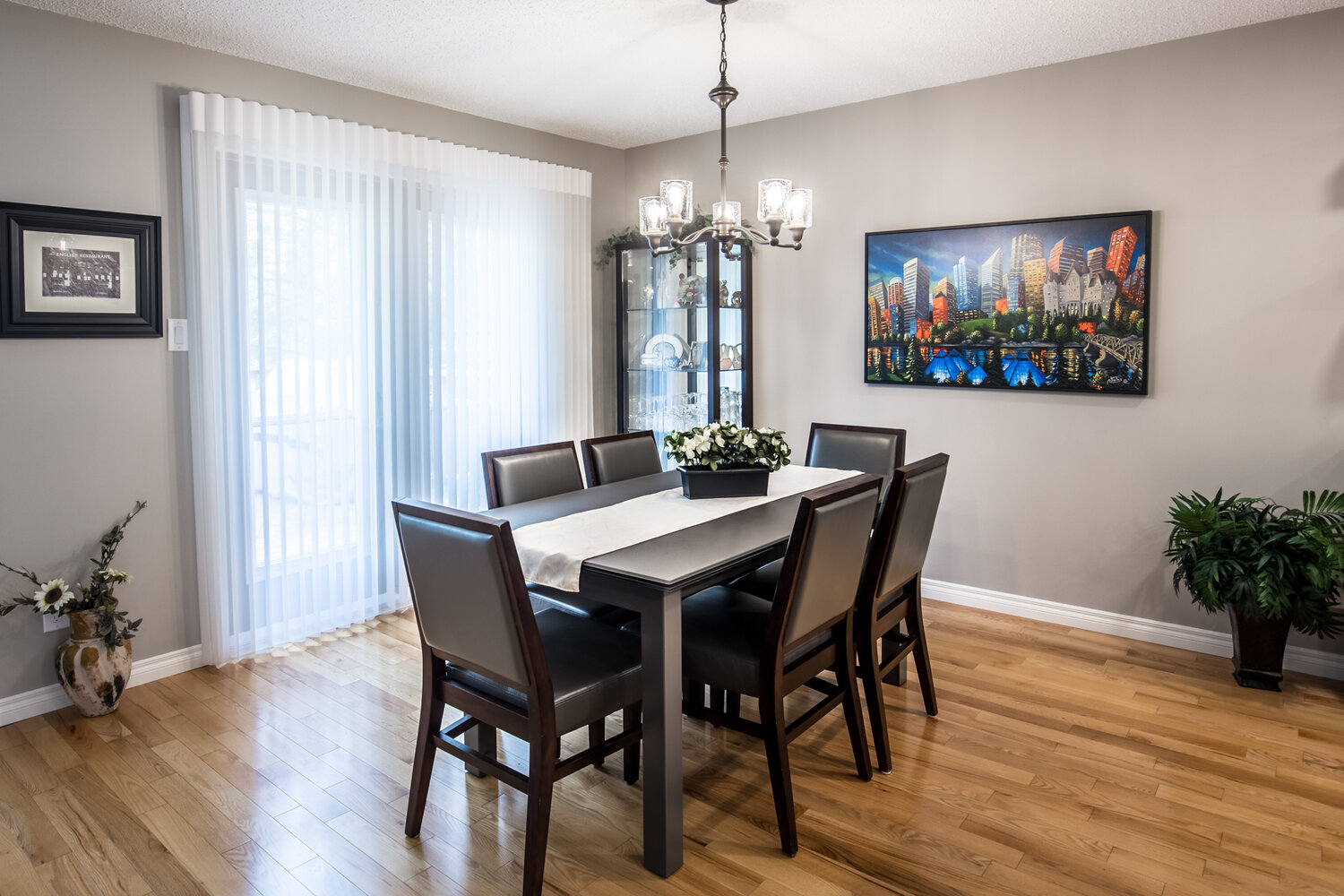 Dining table with lighting fixture