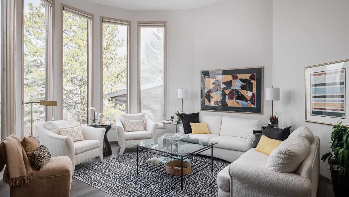 living room with tall windows