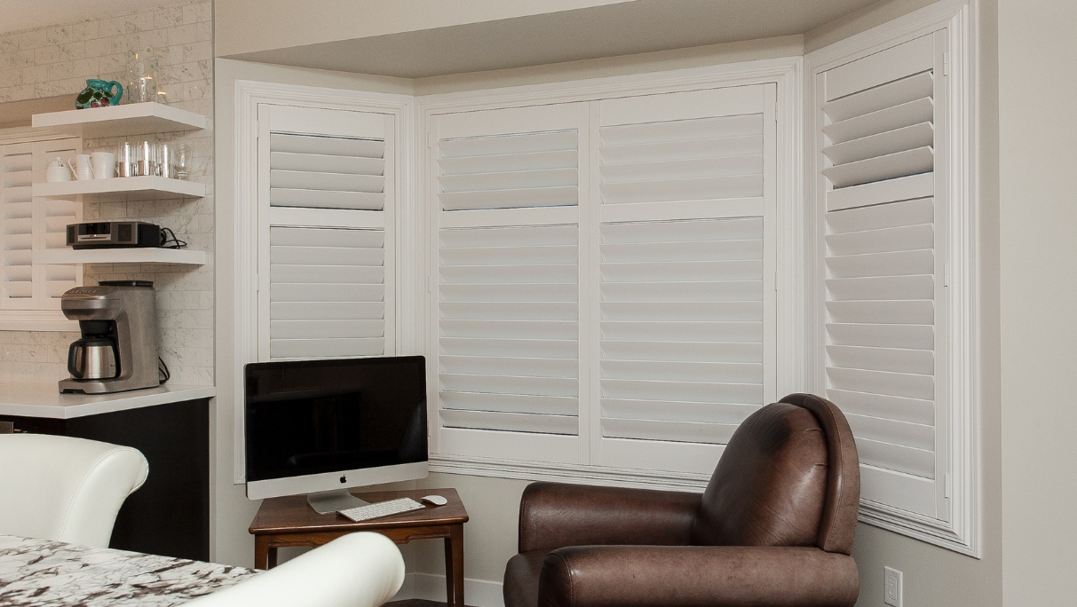 sitting area with window shutters after reno St.Albert